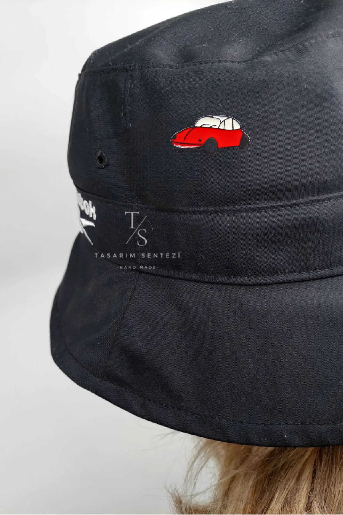 Red Metal Car Badge